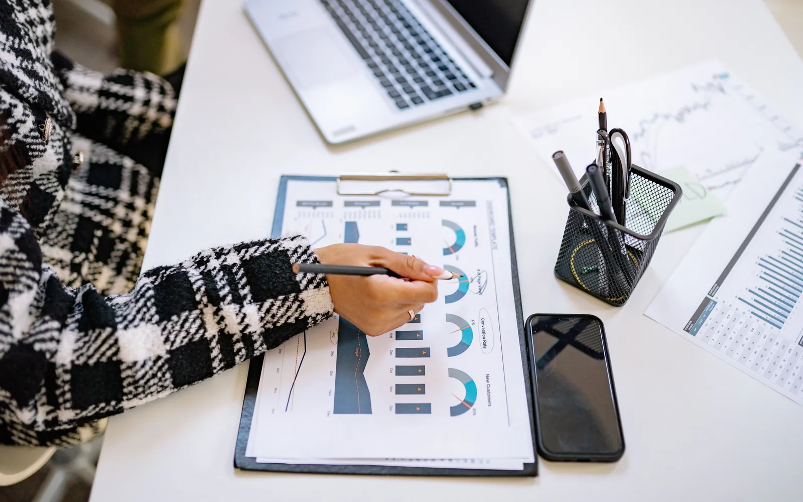 Person checking finances on a laptop